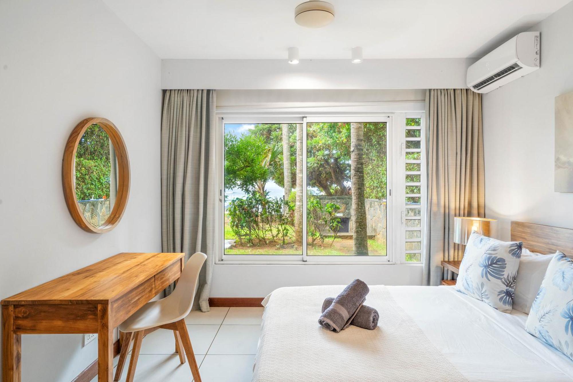 Kanope Bay - Holiday Beachfront Apartments Pointe aux Biches Esterno foto